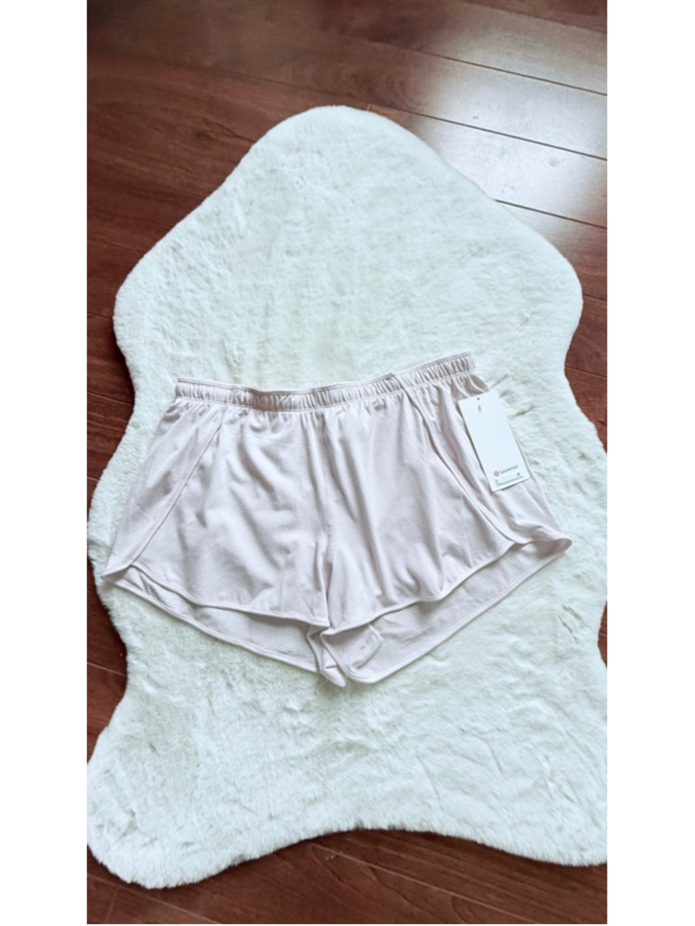 Size 14 swiftly midrise shorts 3" blissful pink,
NWT